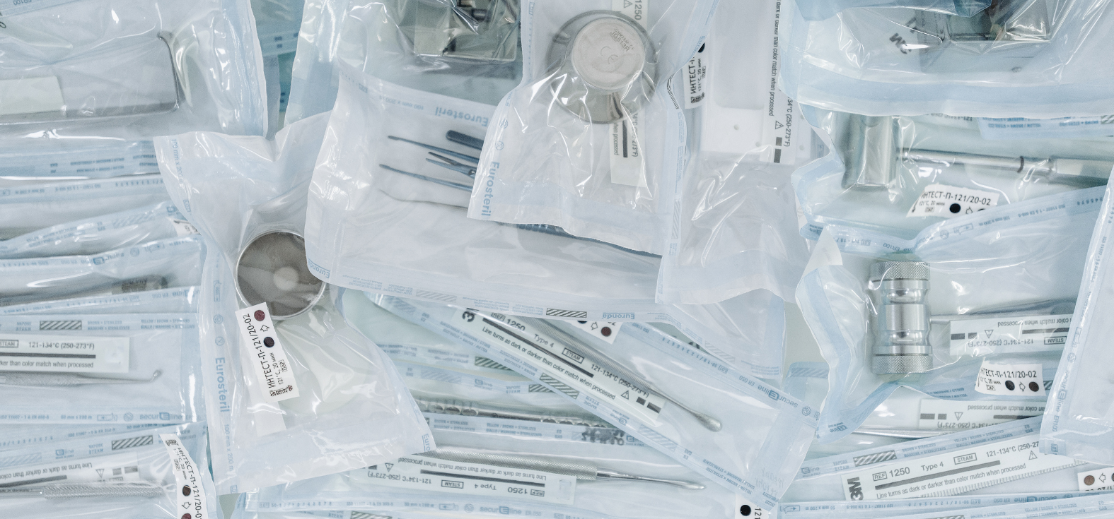 A flat lay of medical supplies all packaged and ready for use.