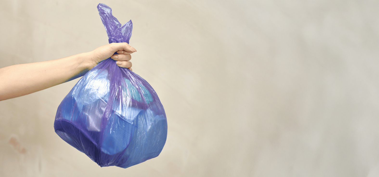 Person holding a quality cytotoxic waste bag ensures safety and efficiency, and is crucial when dealing with medical waste.