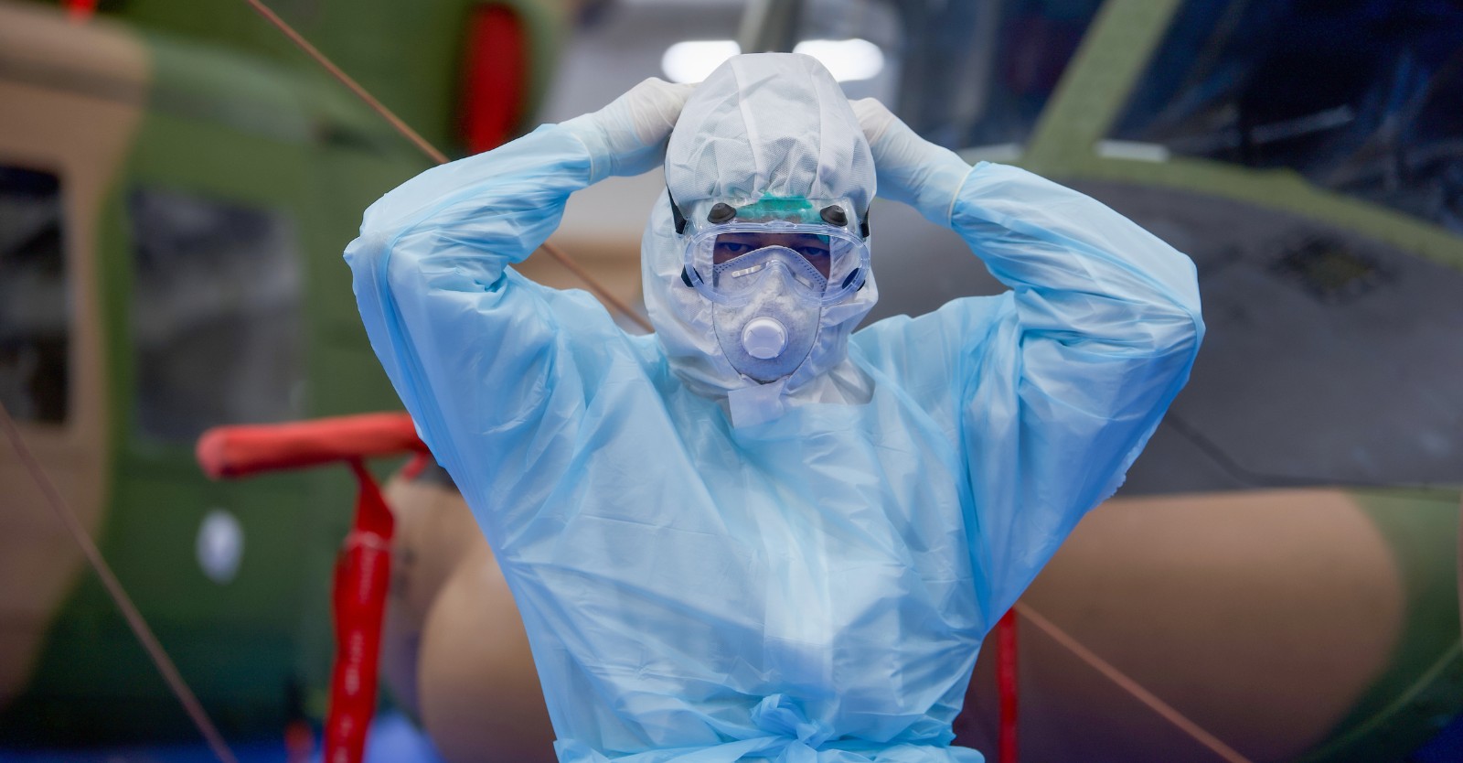 Doctor Wearing Protective Clothing at a hospital before a surgery