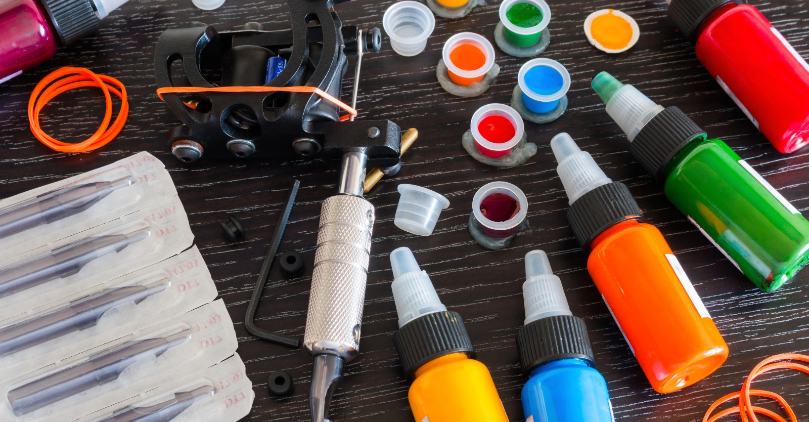Tattoo Accessories for tattoo artists on a black background