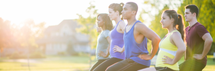 Men and women practicing kegel exercises